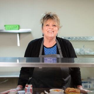 Loretto female kitchen employee